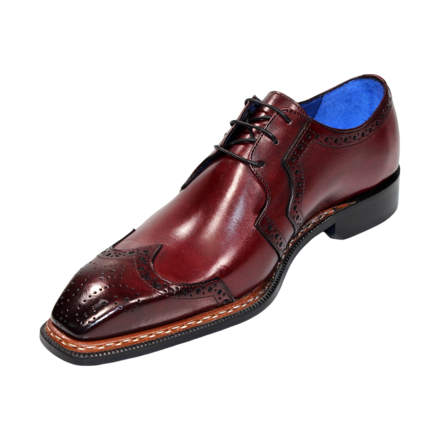 Emilio Franco "Marco" shoes feature a lustrous burgundy leather with intricate brogue detailing and a blue inner lining, showcasing the timeless craftsmanship of being Made in Italy.