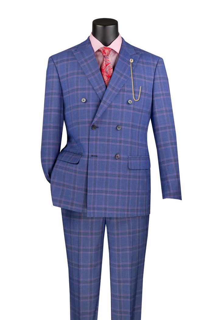 A Vinci Modern Fit Double Breasted Glen Plaid Peak Lapel Suit in blue from Vinci Suits, paired with a red tie and pink shirt, enhanced by a stylish gold chain accessory.