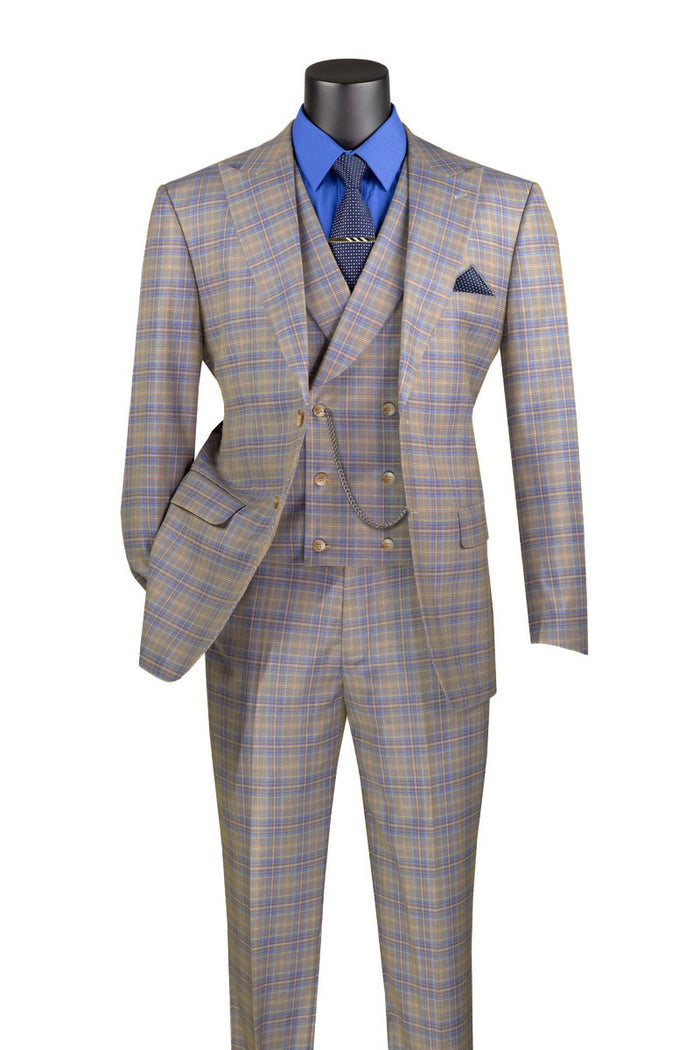 On display is the Vinci Suits' Modern Fit Windowpane Peak Lapel 3 Piece Suit in Blue (MV2W-3), elegantly paired with a blue shirt, patterned tie, and pocket square.