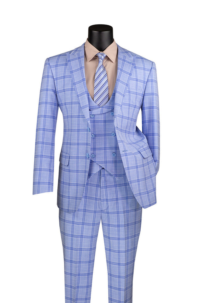 The Vinci Modern Fit Windowpane Suit 3 Piece with U-Neck Vest in Light Blue by Vinci Suits elegantly graces the mannequin, showcasing a sophisticated windowpane pattern. Complemented by a beige shirt and striped tie, this ensemble provides a luxurious wool feel.