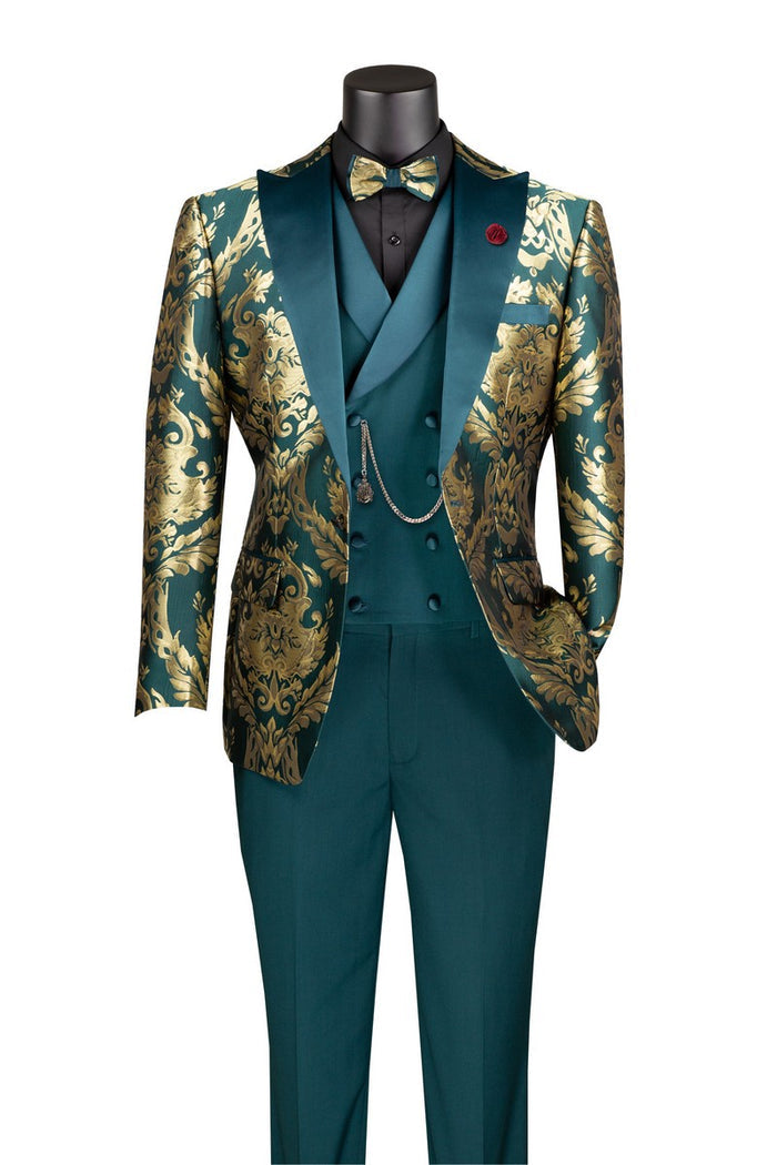 A mannequin dressed in the Vinci Modern Fit 3 Piece Suit with Matching Bow Tie Emerald MVJQ-1 features an ornate green and gold brocade with paisley pattern accents, complete with a matching bow tie and vest chain.