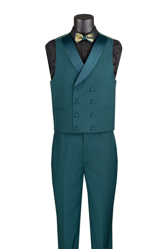 A mannequin dressed in the Vinci Modern Fit 3 Piece Suit with Matching Bow Tie Emerald MVJQ-1 features an ornate green and gold brocade with paisley pattern accents, complete with a matching bow tie and vest chain.