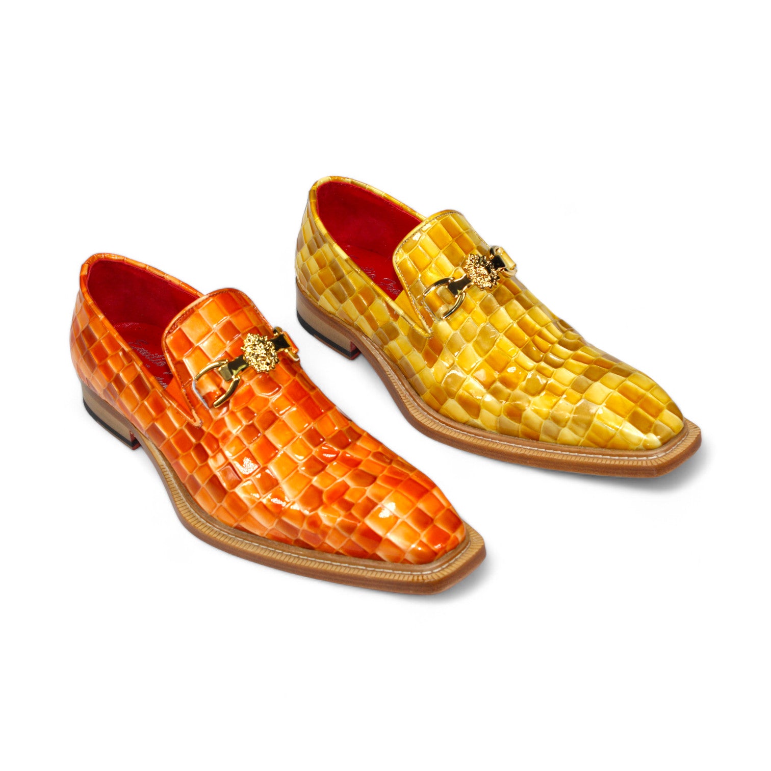 Introducing the Emilio Franco Couture "Narciso" Yellow Combo Shoes, a stunning pair of bright orange and yellow patent leather loafers. Featuring a crocodile pattern, these shoes boast luxurious red interiors and decorative gold lion emblems, adding a dash of Italy-inspired elegance.