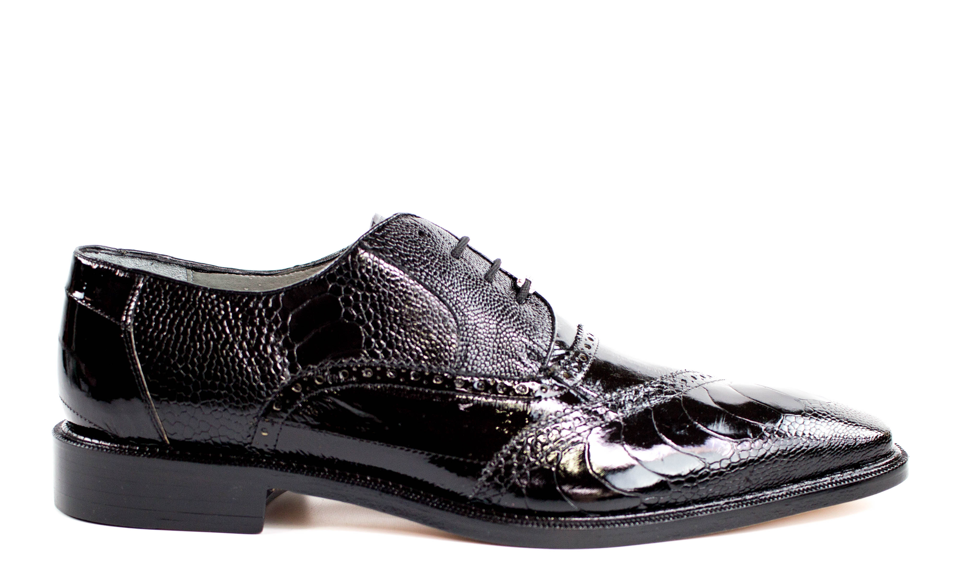 Introducing the Belvedere - Nino, a genuine ostrich leg and eel dress shoe in classic black by BELVEDERE. This elegant shoe features a lace-up design and decorative stitching, highlighted by textured details inspired by ostrich leg patterns. Experience the luxurious comfort of its leather lining set against a white background.