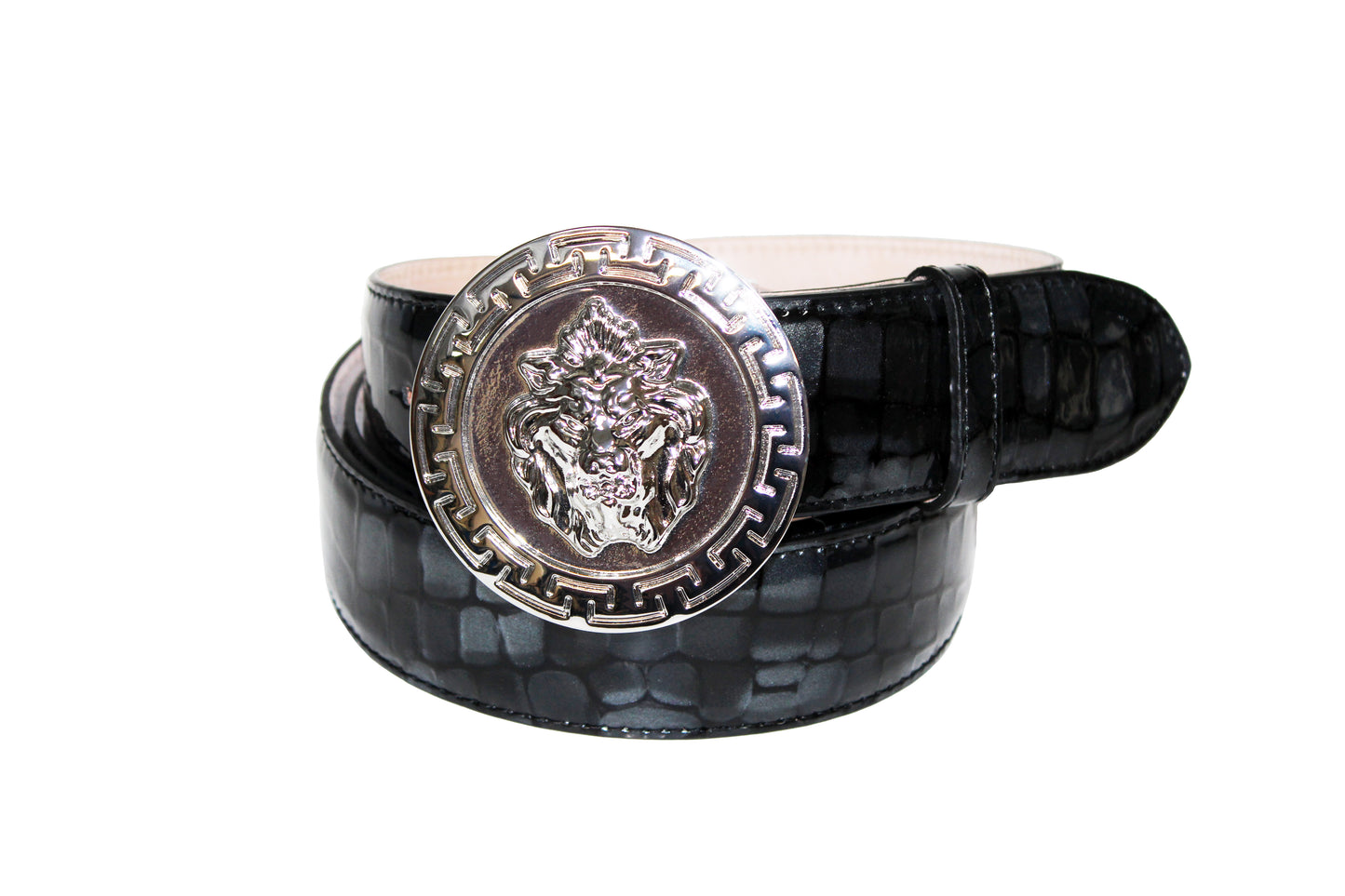 A rolled-up Emilio Franco Couture belt in glossy patent leather, displaying a large silver buckle with an embossed lion's head design.