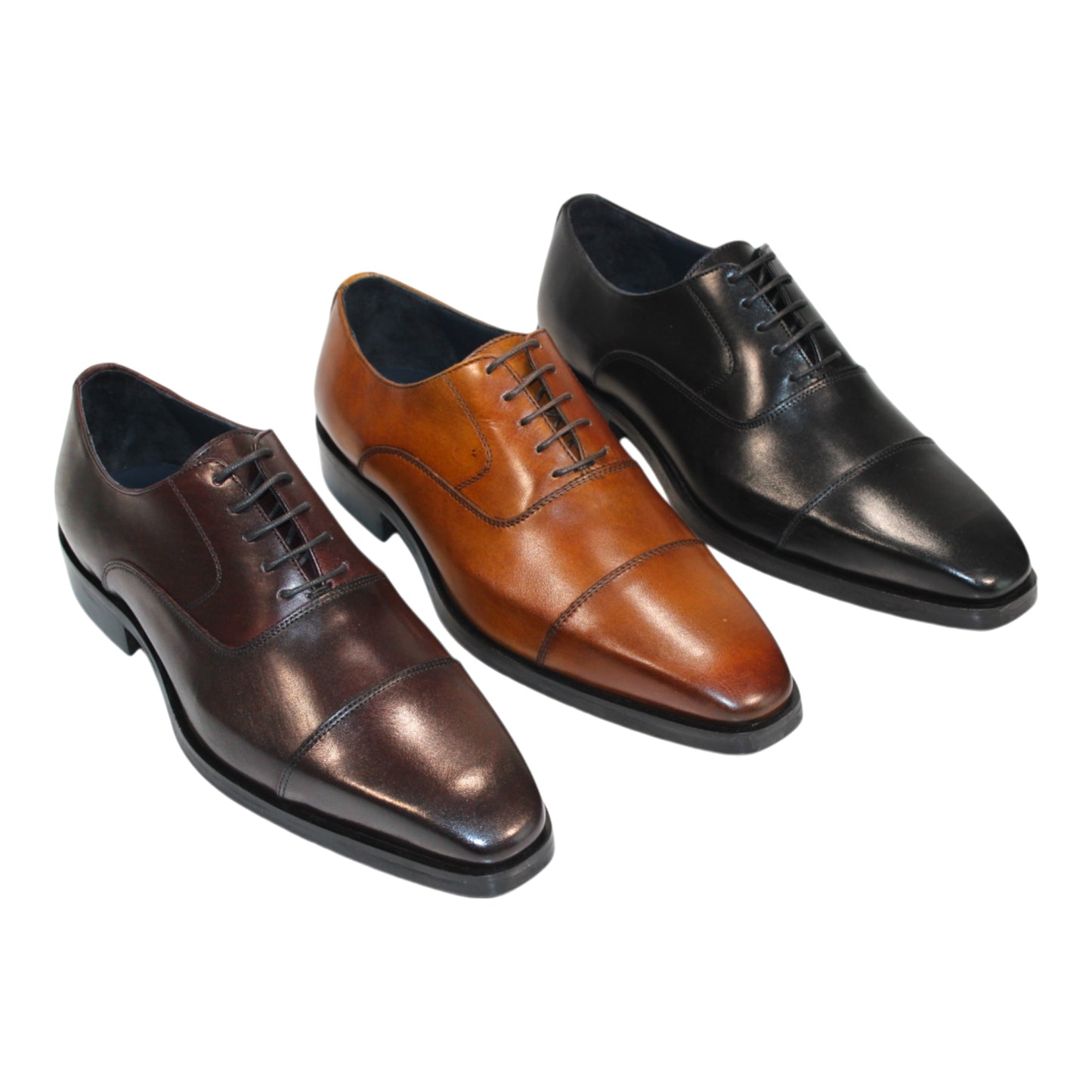 The Firmani Owen Black Shoes feature a solitary black leather dress shoe with laces, highlighting a cap toe design and low heel, as seen from the side. Masterfully crafted in Italy by Firmani, it represents timeless elegance and expert craftsmanship.