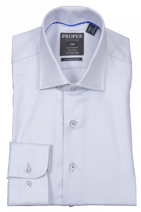 A folded gray dress shirt with a raised collar and regular buttoned cuffs features the label "Proper Shirtings, Pure Cotton." This wrinkle-free garment ensures you stay crisp from morning meetings to evening engagements.