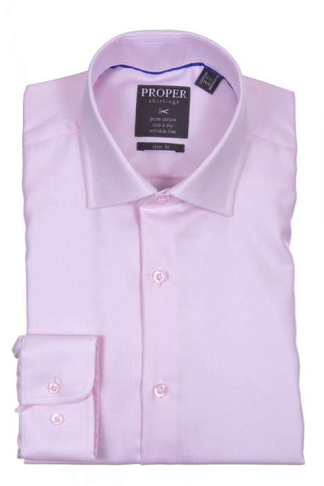 A neatly folded light pink dress shirt with the "Proper Shirtings" label, made from pure cotton. The PROPER SHIRTINGS PINK SLIM FIT REGULAR CUFF P205SPRX-PIN offers a slim fit design that is both stylish and wrinkle-free, ensuring you always look polished with minimal effort.