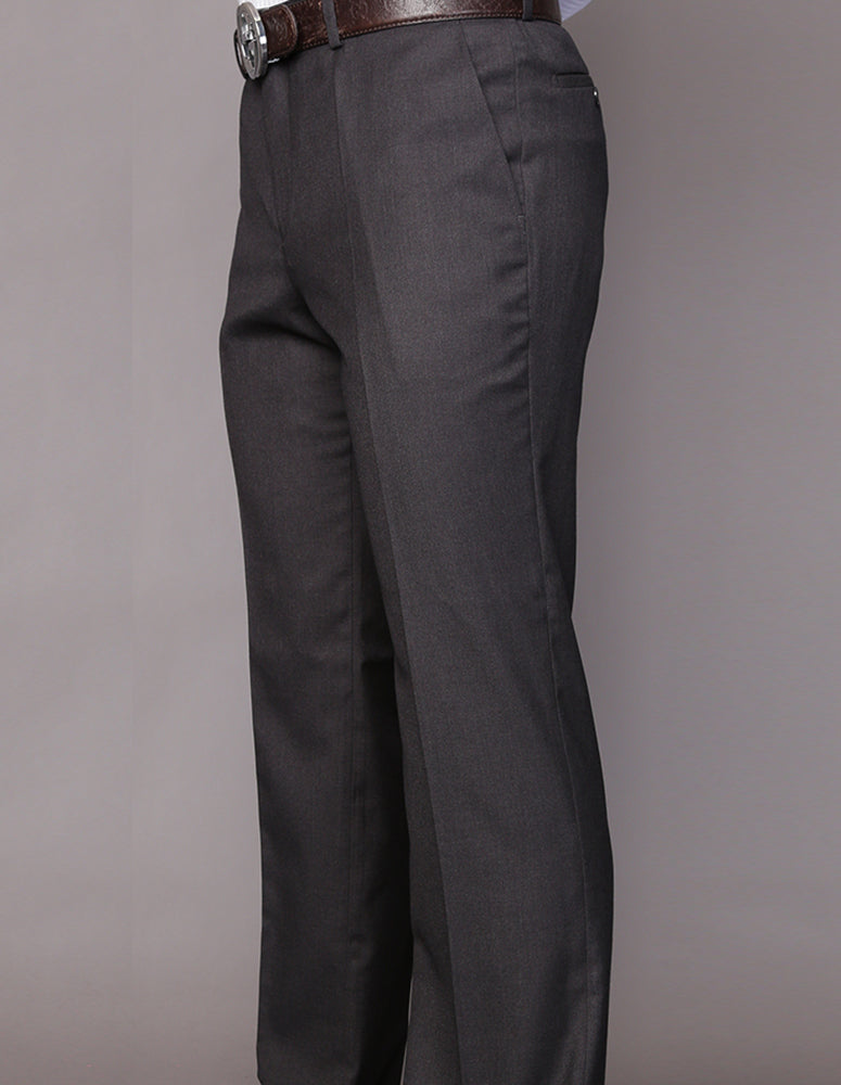 A person wearing Statement Clothing's Modern Fit Solid Color Pants, style PA-200B-H.CHAR, in a dark grey hue, paired with a brown belt stands against a plain grey background.