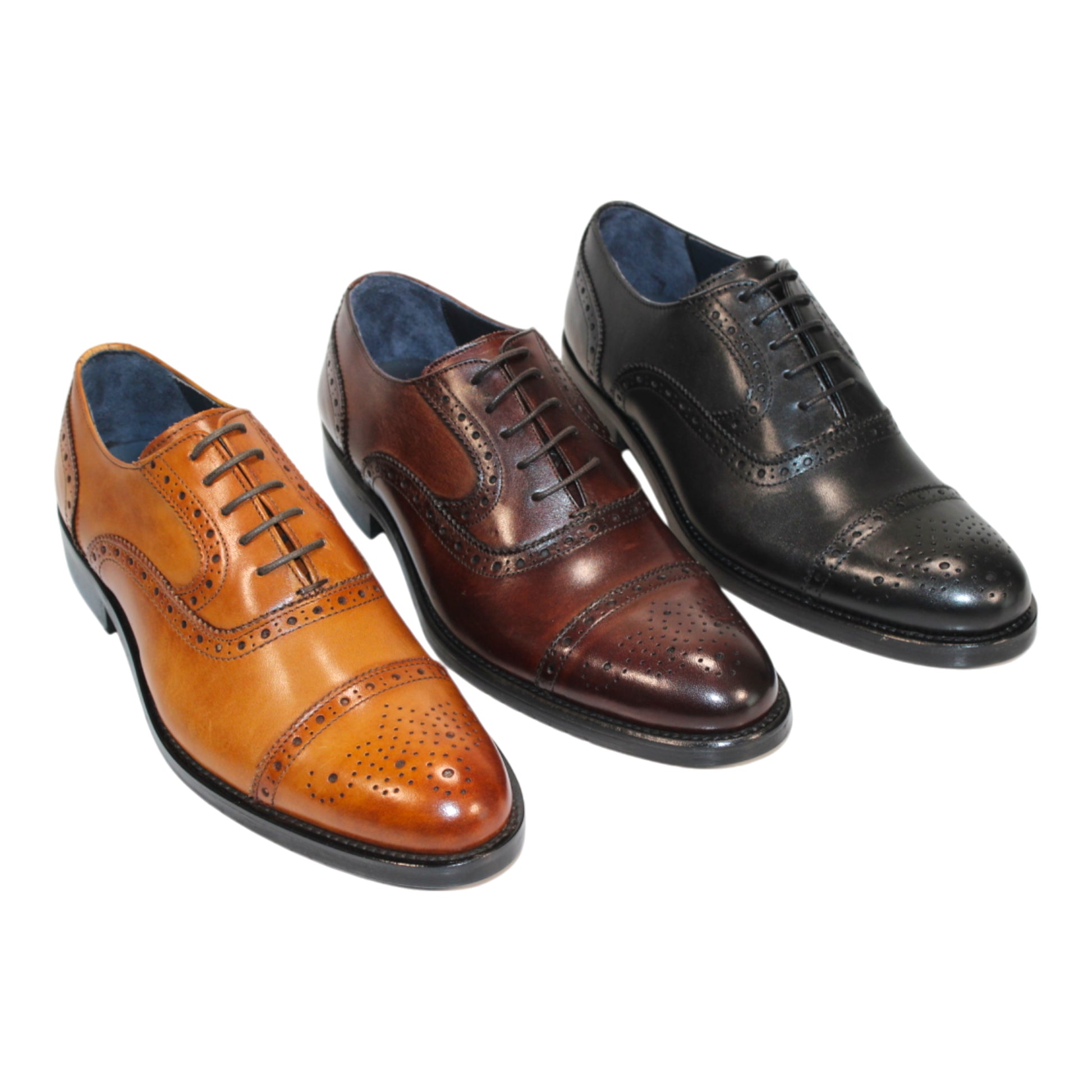 Displayed are three pairs of Firmani leather dress shoes, including the elegant Paul Cognac in tan, brown, and black hues, all featuring decorative perforations on the toe and sides that highlight their classic style.