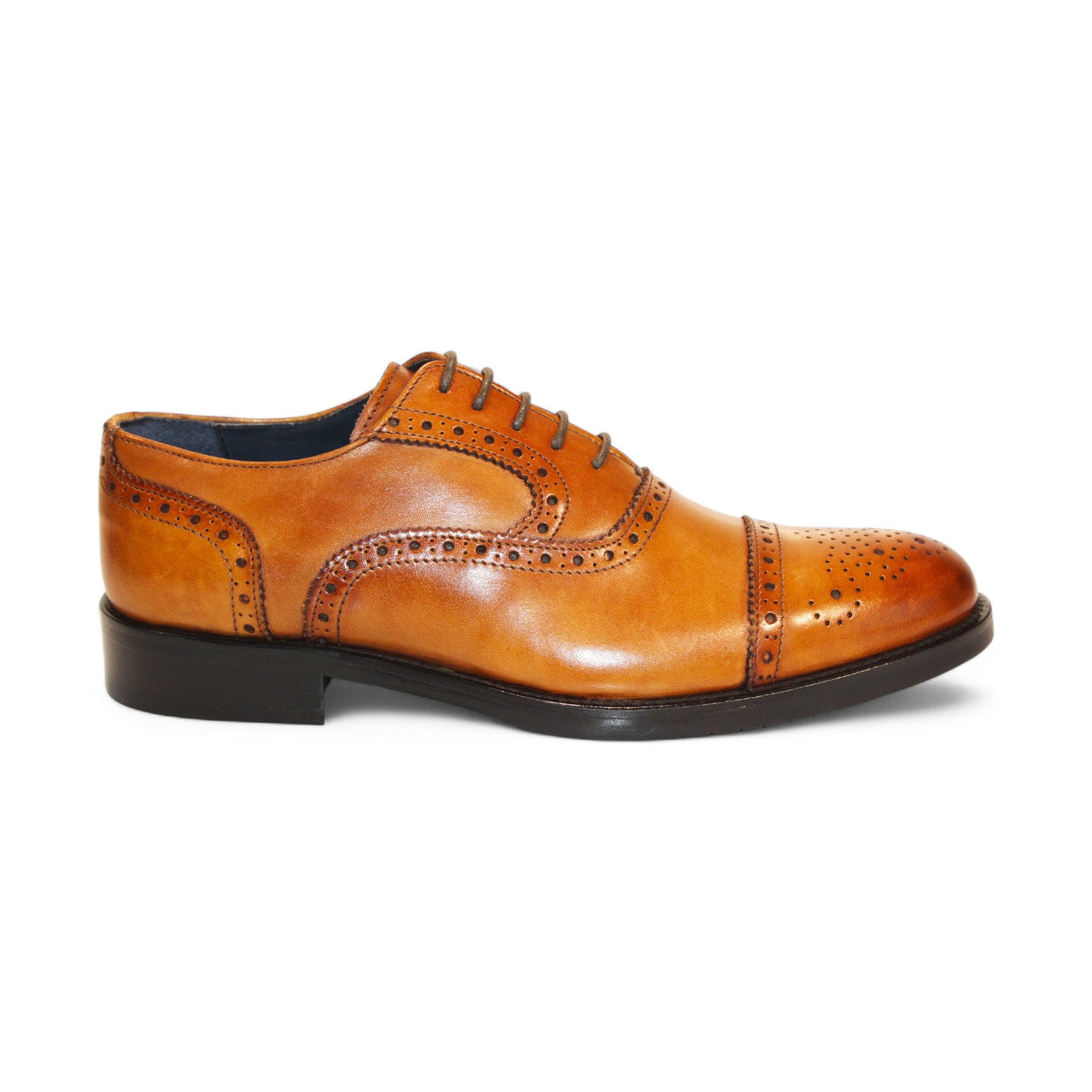 Displayed are three pairs of Firmani leather dress shoes, including the elegant Paul Cognac in tan, brown, and black hues, all featuring decorative perforations on the toe and sides that highlight their classic style.