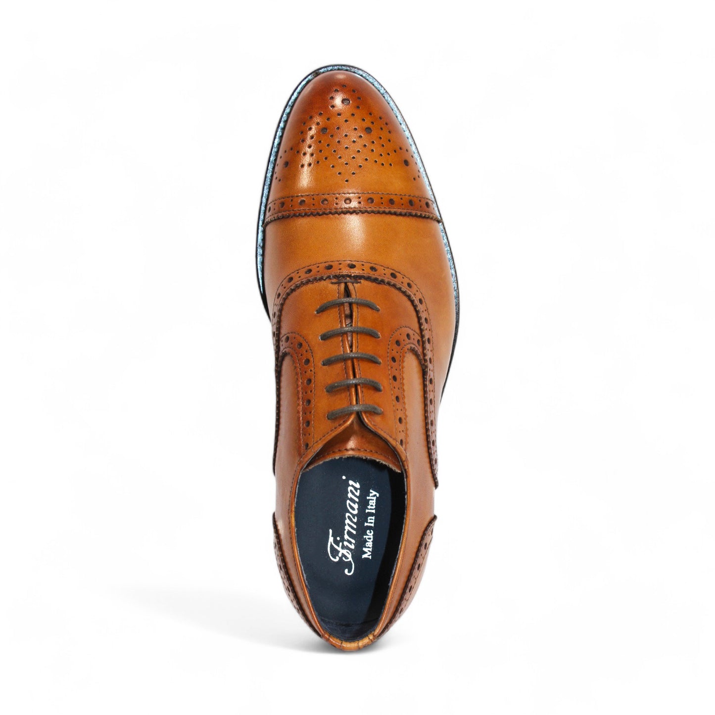 Displayed are three pairs of Firmani leather dress shoes, including the elegant Paul Cognac in tan, brown, and black hues, all featuring decorative perforations on the toe and sides that highlight their classic style.