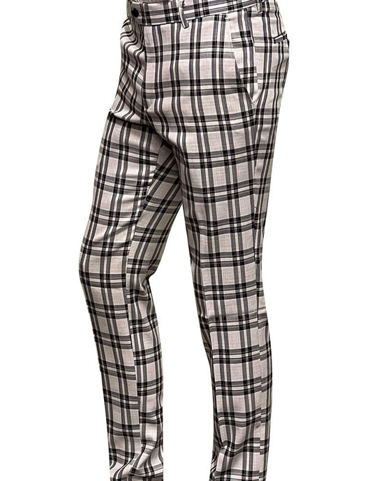 A person stands against a white background, wearing the STATEMENT CLOTHING ﻿PLAID SLIM FIT PANTS PL-300-BLACK by Statement Clothing, which skillfully combine black and white plaid for a fashionable appearance.