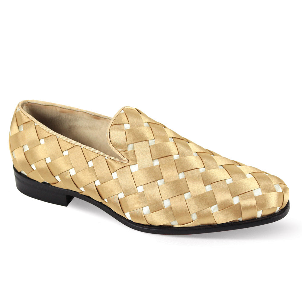 The After Midnight Exclusive Prince Natural/Cream Dress Shoes by AFTER MIDNIGHT feature a woven gold design, slip-on style, with a plain toe and a black sole, beautifully showcased against a white background.