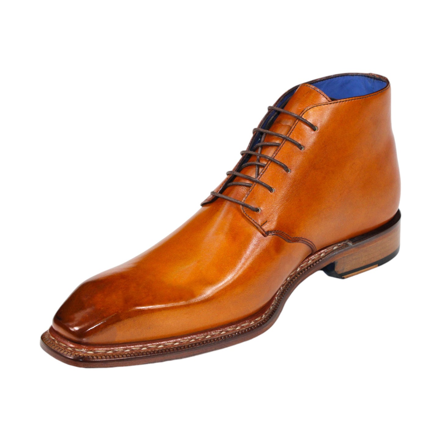 The Emilio Franco "Rocco" Gold Boot, a men's dress boot crafted from tan leather in Italy, showcases a blue interior lining and brown laces. It features a square toe and a low heel.