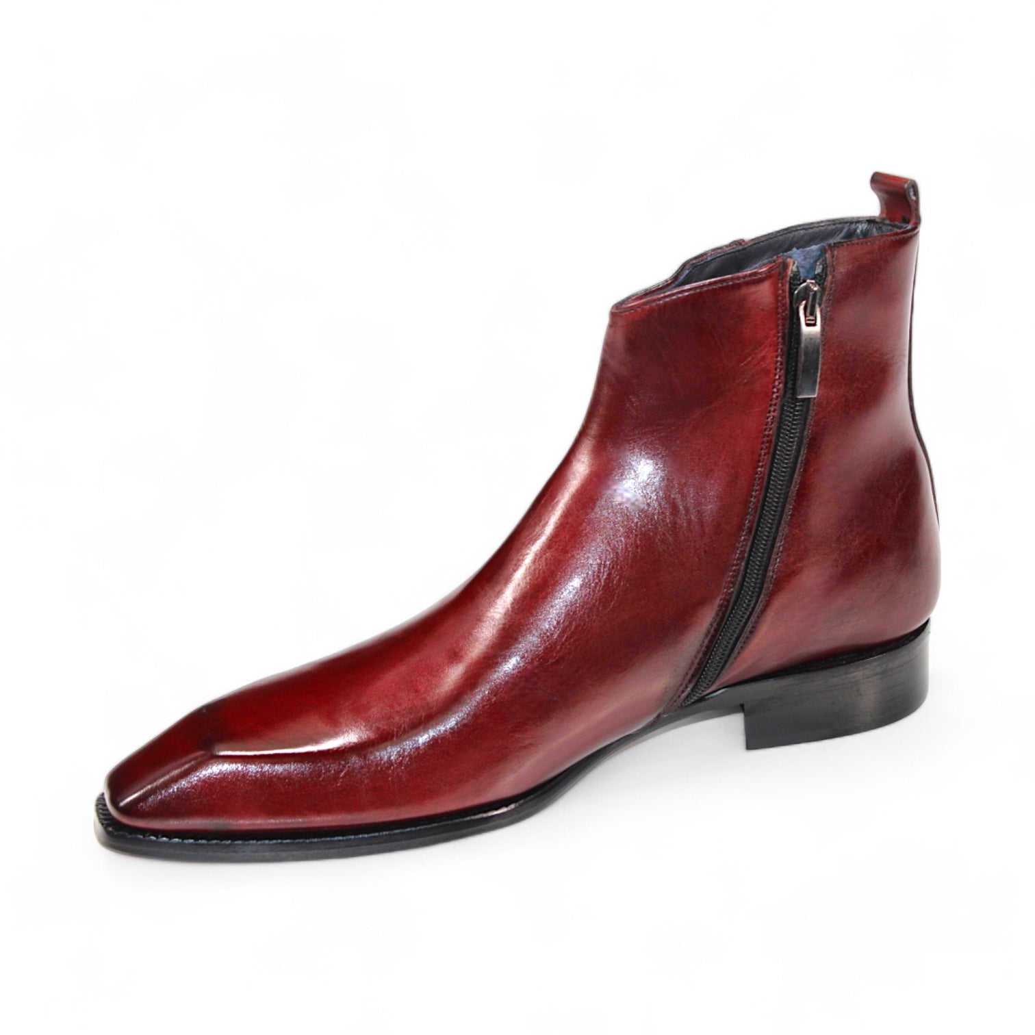 The Duca Di Matiste Romano (Cordovan) ankle boot is a polished, dark red footwear piece crafted from genuine leather, featuring a side zipper and a low black heel, made in Italy and displayed on a white background.