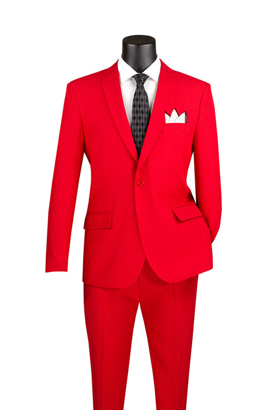 A mannequin elegantly displays the Vinci Slim Fit 2 Piece 2 Button Business Suit in bright red, accented with a black tie and white pocket square, set against a crisp white background.