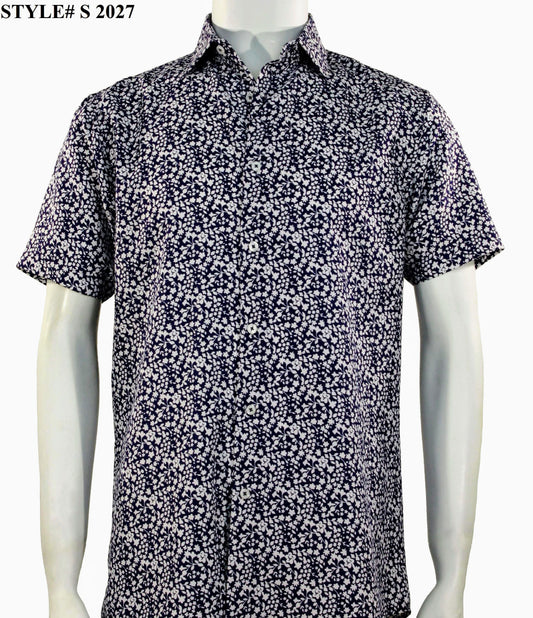 A mannequin displays the Sangi Short Sleeve Shirt S 2027 from the brand Sangi, featuring a modern fit with a black and white floral pattern. The style number is prominently shown in the top left corner, embodying contemporary fashion.