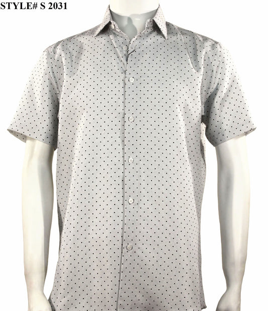 A mannequin showcases a modern light gray short-sleeve button-up shirt from Sangi, featuring small black polka dots that highlight its fit, labeled as the "Sangi Short Sleeve Shirt S 2031" in the top left corner.