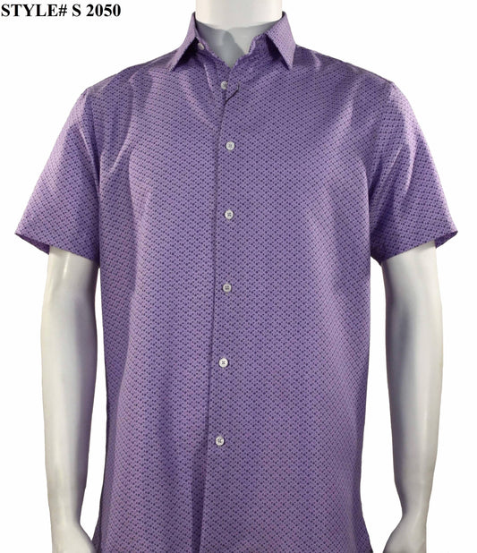 A mannequin displays the Sangi Short Sleeve Shirt S 2050, a modern-fit, purple button-up with a small geometric pattern. The text "STYLE# S 2050" is elegantly positioned in the top left corner.