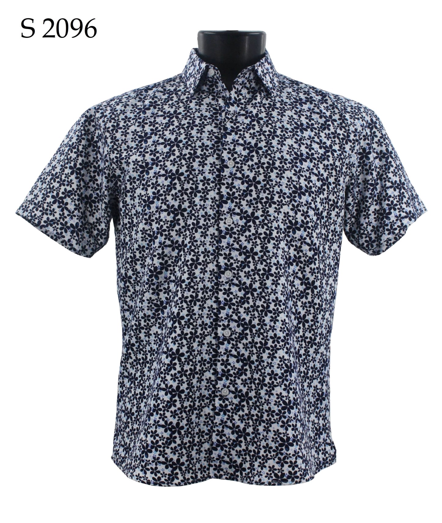 The Sangi Short Sleeve Shirt, model S 2096, featuring a contemporary black and white floral design, is gracefully displayed on a mannequin.