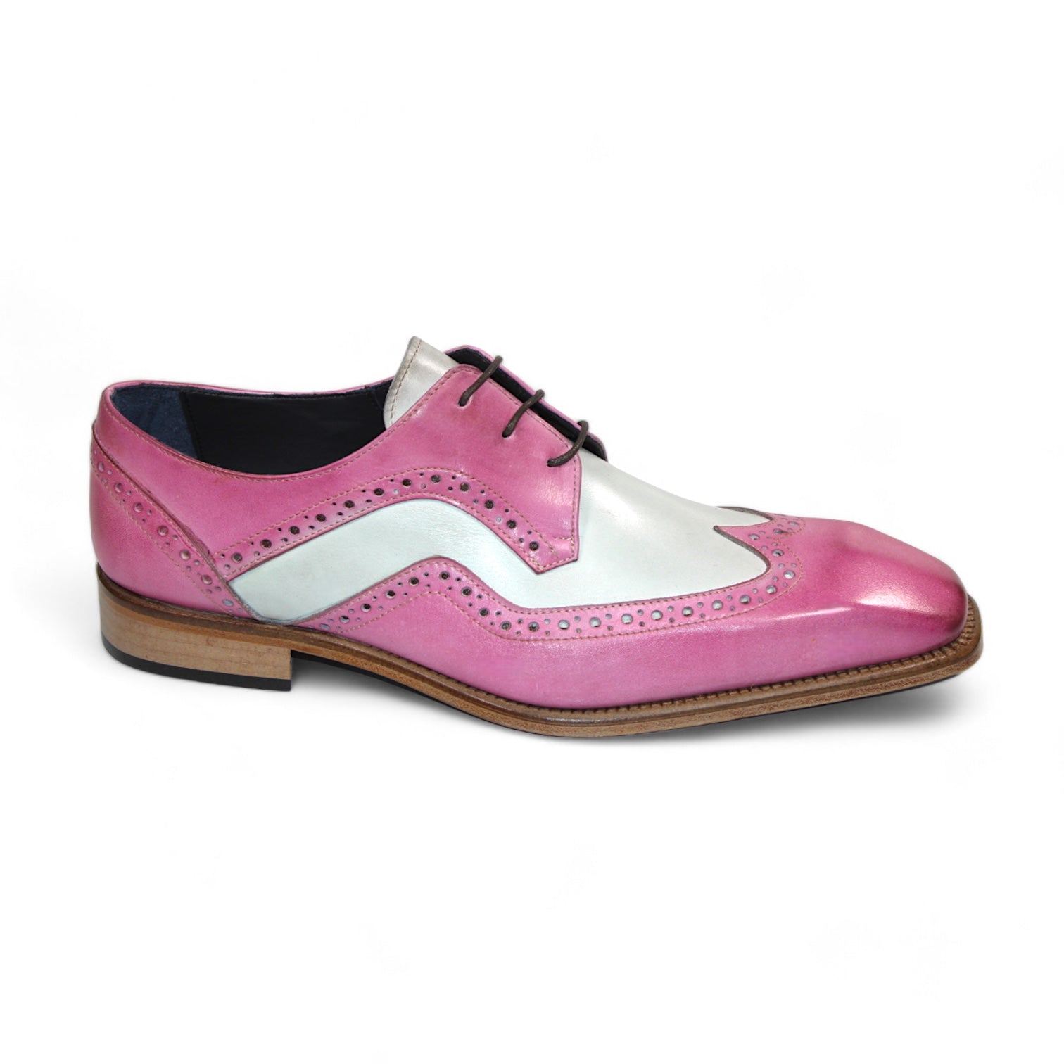 The Duca Di Matiste Saranno (Pink/Bone) is an exquisite men's dress shoe crafted from pink, white, and light brown leather, featuring decorative perforations and black laces. Made in Italy by Duca Di Matiste, it showcases impeccable craftsmanship and style.