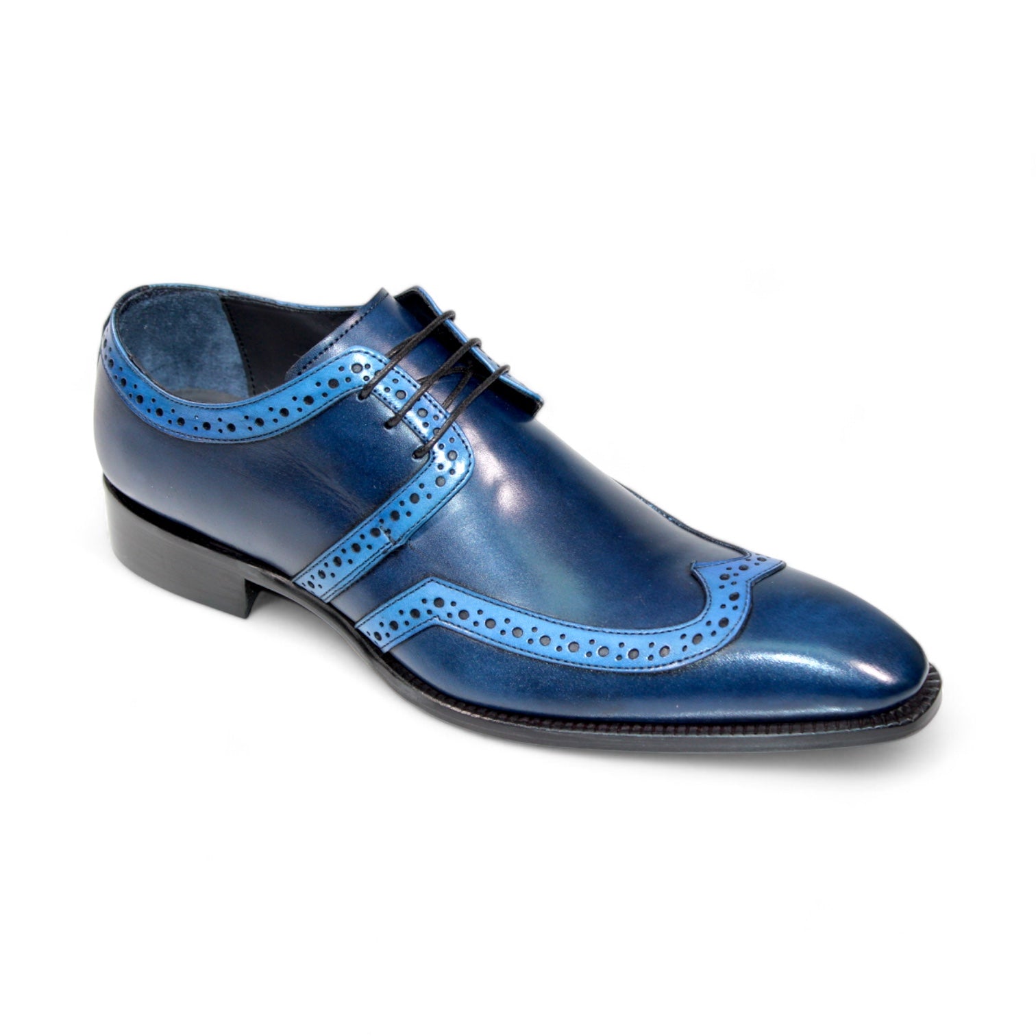 The Duca Di Matiste Savona in Navy/Light Blue, featuring decorative perforations and dark laces, is expertly crafted in Italy and displayed on a white background.