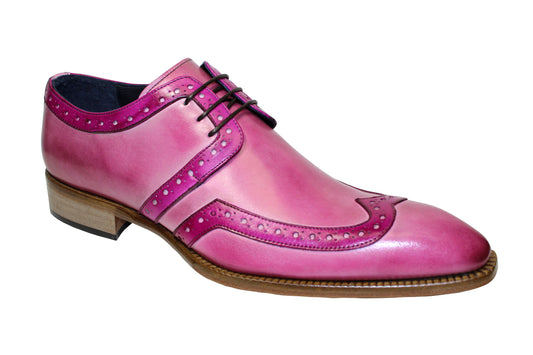 The Duca Di Matiste Savona (Pink/Fuscia) is a leather dress shoe with a dark sole and decorative perforations along the edges, expertly crafted and made in Italy by the renowned brand Duca Di Matiste.