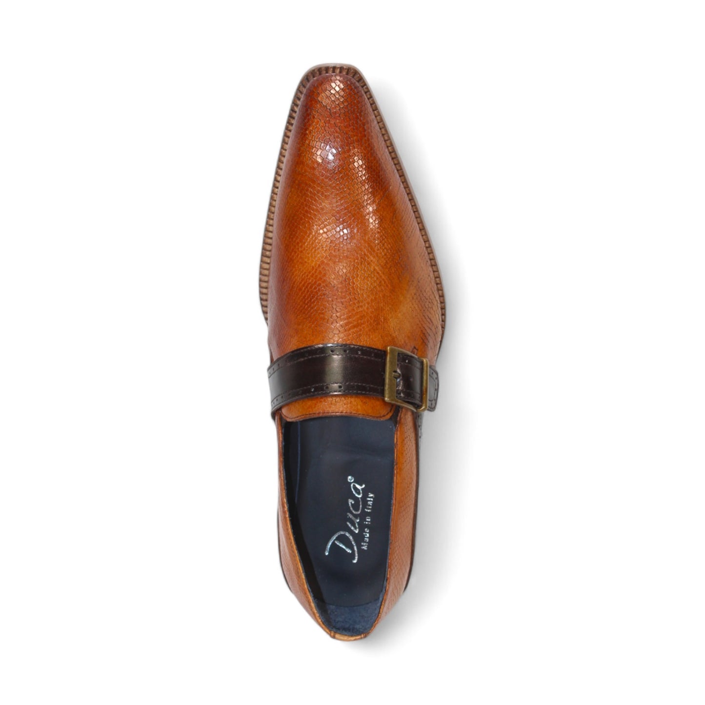 Introducing the Duca Di Matiste Sezze in Cognac and Chocolate: a polished brown leather dress shoe with a sophisticated textured finish, adorned with a sleek black strap and an elegant buckle detail on top. Expertly crafted in Italy by Duca Di Matiste, these shoes embody both sophistication and exceptional quality.