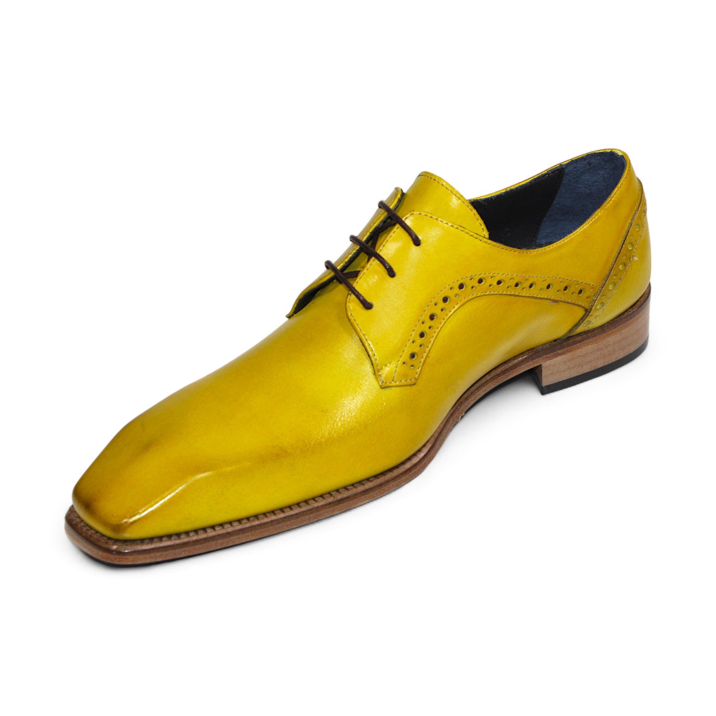 The Duca Di Matiste Spada in yellow is a leather dress shoe featuring brown laces and a wooden heel, adorned with decorative perforations along the sides. Crafted in Italy, these shoes exemplify an ideal combination of craftsmanship and elegance.