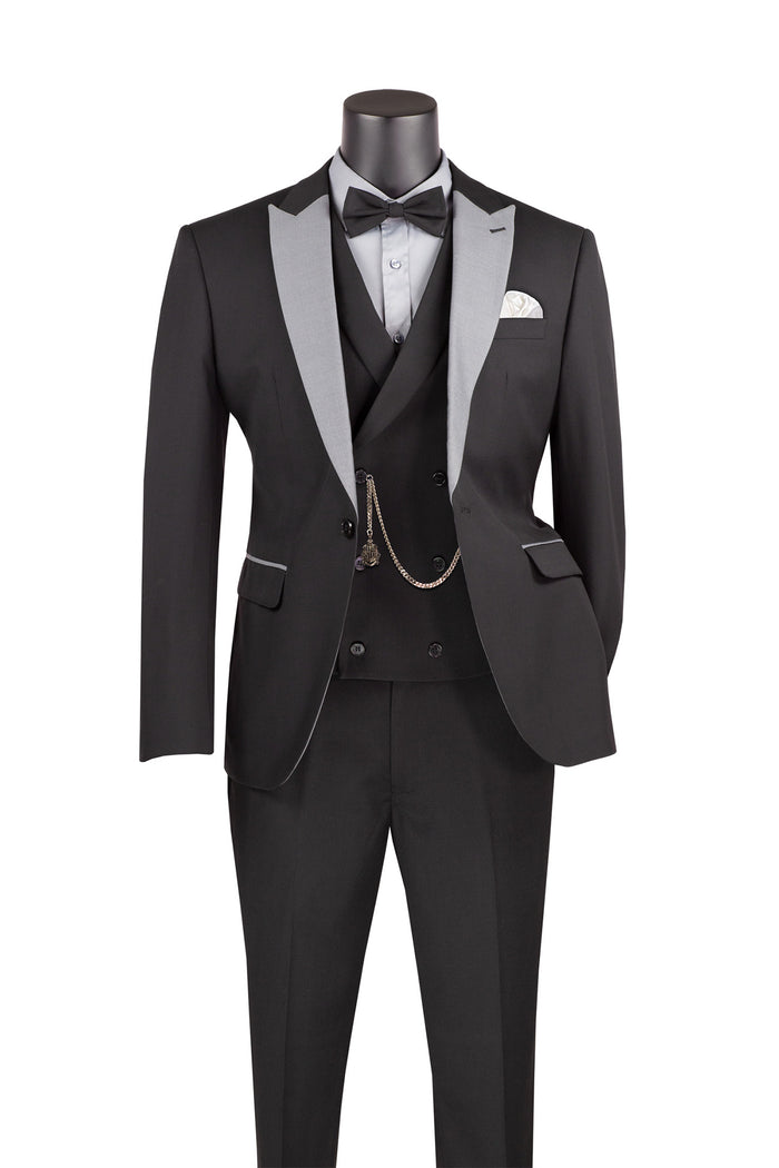 The Vinci Suits Slim Fit 3 Piece Tuxedo Black SV2K-5, elegantly displayed on a mannequin, features a luxurious wool feel and includes a sleek silver shawl collar, matching bow tie, and pocket square.