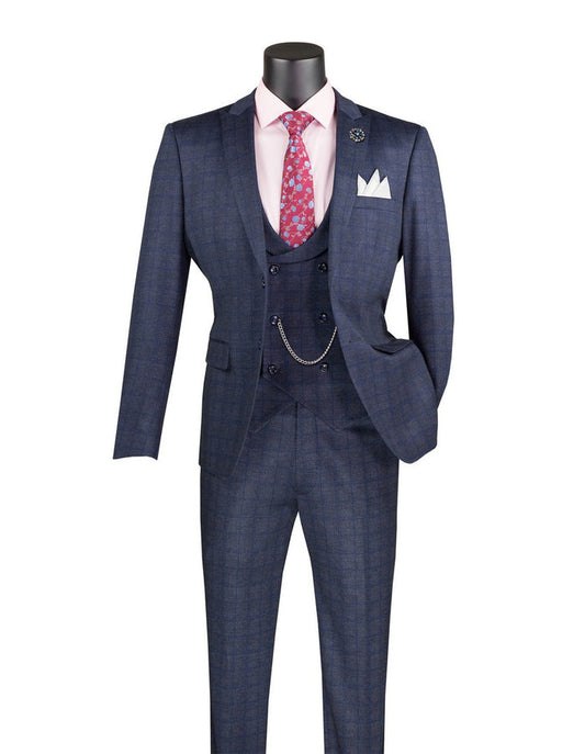 A mannequin sports a Vinci Suits Slim Fit 3 Piece Stretch Fabric Suit with Armholes in Navy SV2W-8, paired with a pink shirt, red patterned tie, pocket square, and a chain elegantly attached to the vest.