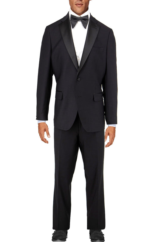 A man wearing the Tiglio Luxe Dolcetto Black Modern Fit Tuxedo (Tig1001) stands facing forward against a white background, highlighting the contemporary European fit of Tiglio tuxedos.