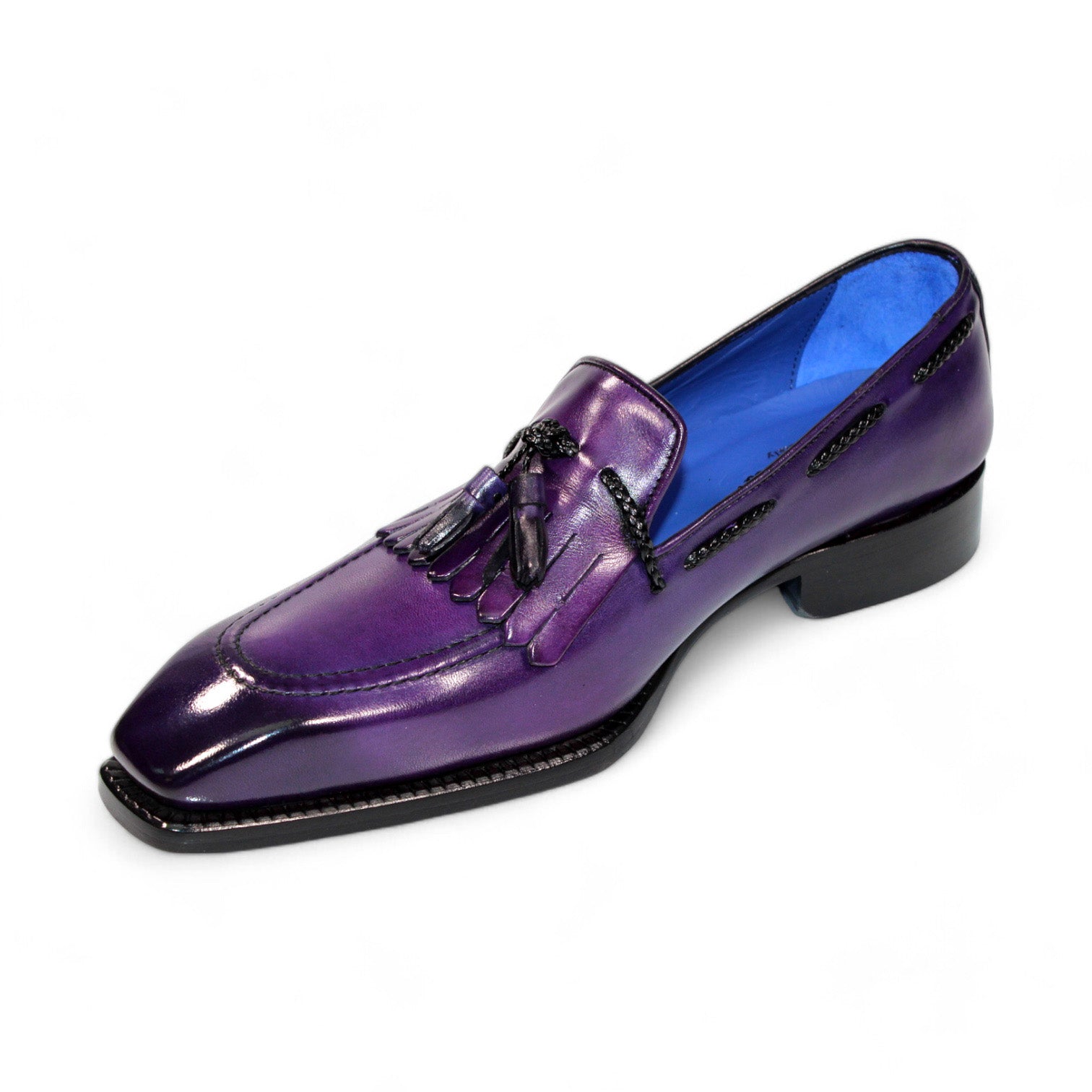 The Emilio Franco "Tommaso" Purple Shoes feature a meticulously crafted single leather loafer with tassel and fringe details, made in Italy. It showcases a striking blue interior lining against a crisp white background.