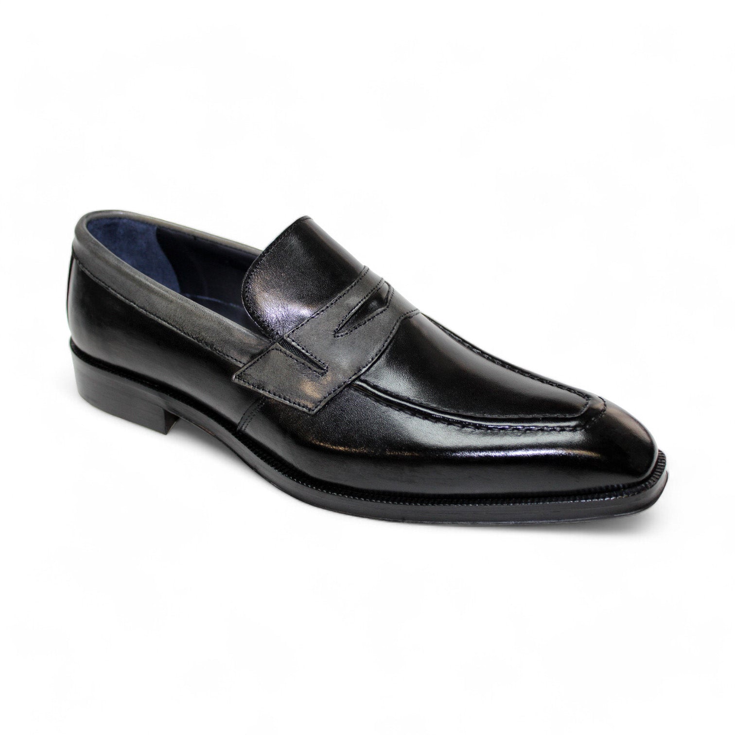 The Firmani Trevor Black/Grey Shoe, featuring a penny strap design, slight heel, and intricate stitching details, is crafted in Italy and set against a plain white background.