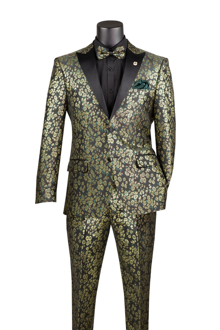 Displayed on a mannequin, the Vinci Suits Emerald TSJQ-1 exhibits a patterned green suit with Peak Lapels, paired elegantly with a black shirt and matching bow tie. This Slim Fit Tuxedo from Vinci Suits combines elegance with style, making it perfect for any sophisticated occasion.