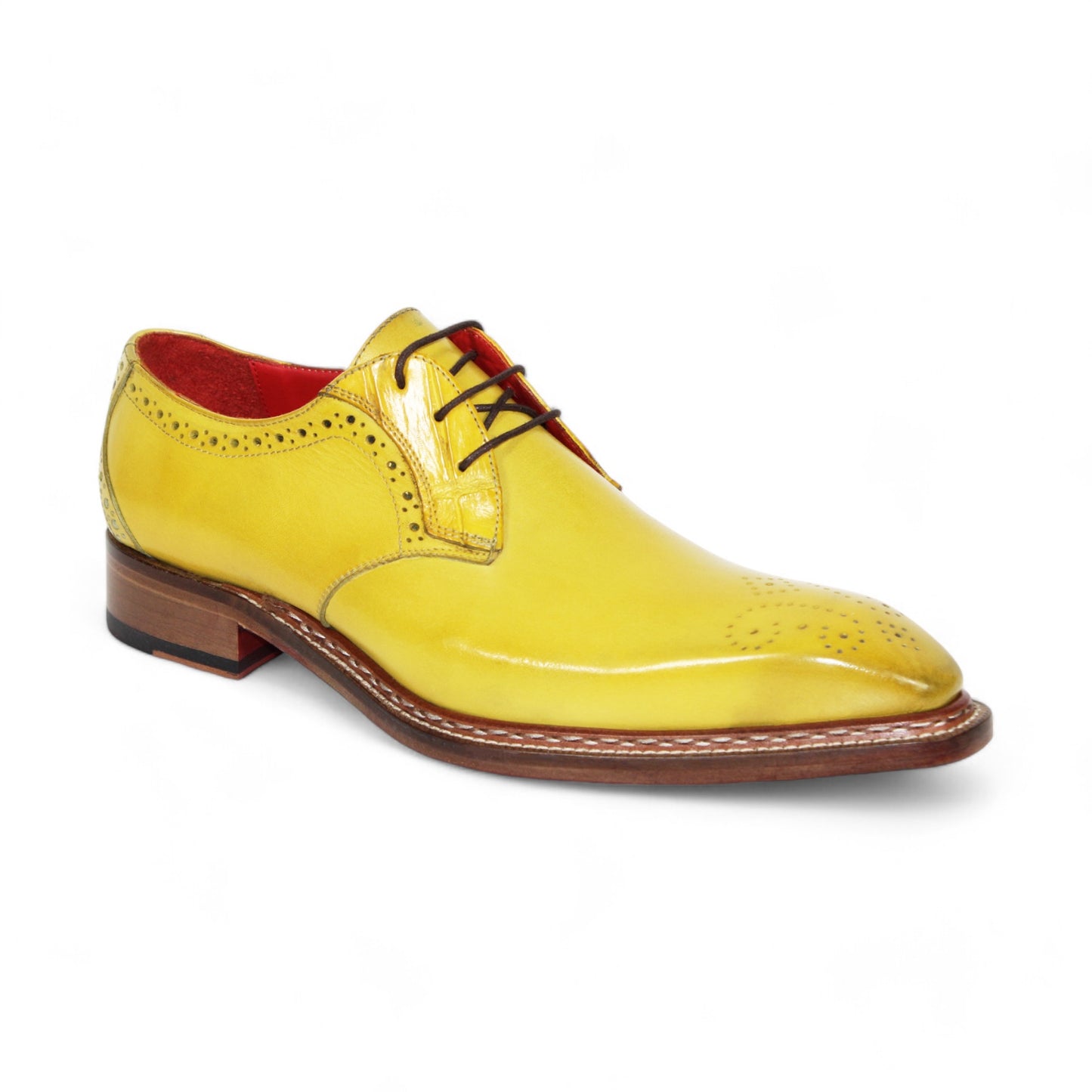 The Fennix "Tyler" Yellow Shoes by Fennix of Italy are crafted in Italy, featuring brown laces, brogue detailing, and a red interior lining.