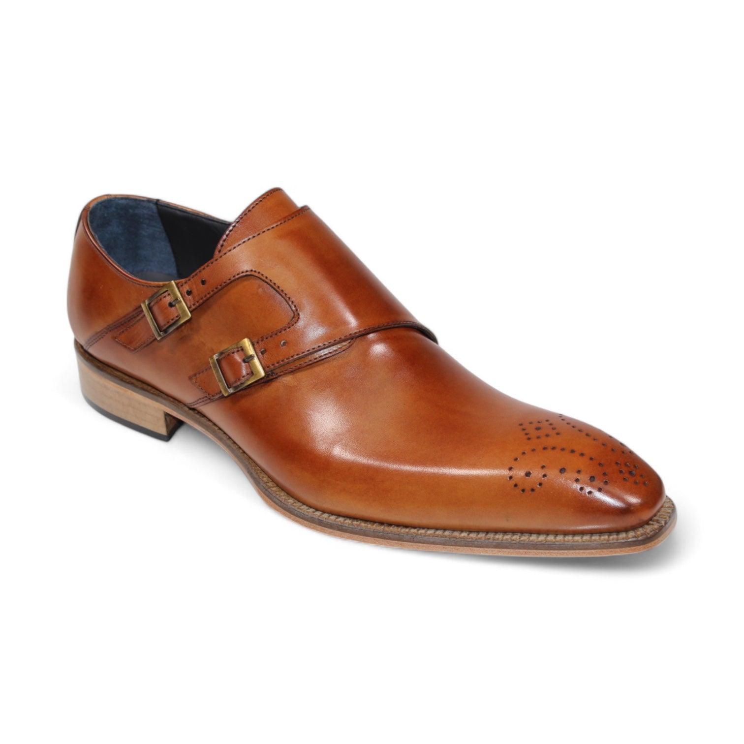 Expertly designed, the Duca Di Matiste Vergato (Brandy) shoe by Duca Di Matiste showcases intricate brogue detailing on the toe and a robust wooden heel. Crafted in Italy, it offers timeless elegance and exceptional craftsmanship.