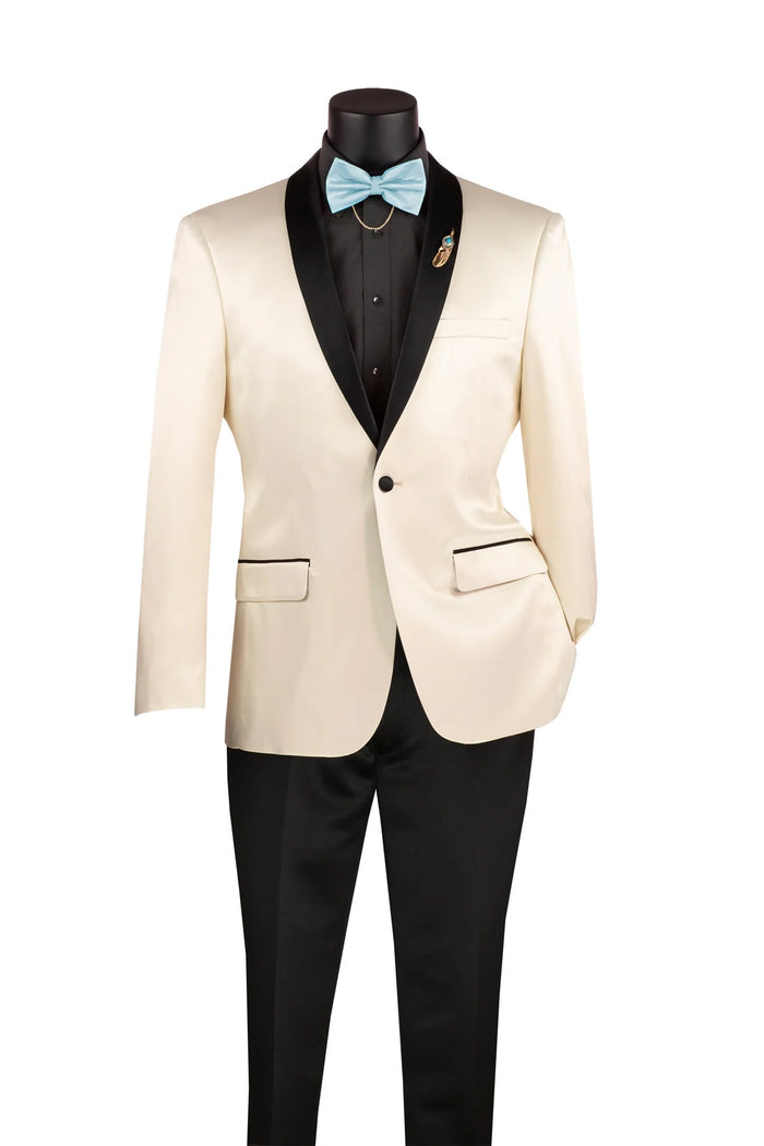 A mannequin showcases the Vinci Suits Slim Fit Sport Coat with a narrow shawl lapel in champagne beige, paired with a wrinkle-resistant black shirt and trousers, completed by a light blue bow tie.