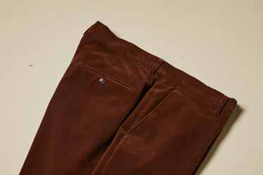 Inserch Velvet Pants P502-131 in Swiss Chocolate offer a modern fit with a visible back pocket and button, showcased on a plain background.