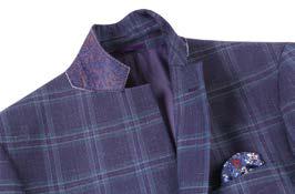 The Alessandro Vitello by Renoir, product code 565-6, in navy blue plaid with a notch lapel elegantly drapes on the mannequin when paired with a light shirt and red tie. Crafted from fine wool by Renoir, this side-vented slim fit sport coat adds a touch of sophistication.