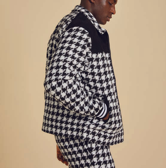 A person wearing the Inserch Wool Blend Houndstooth Suit JS264-41 in Black/White, featuring a 2-way zipper jacket and regular fit pants, stands against a neutral background.