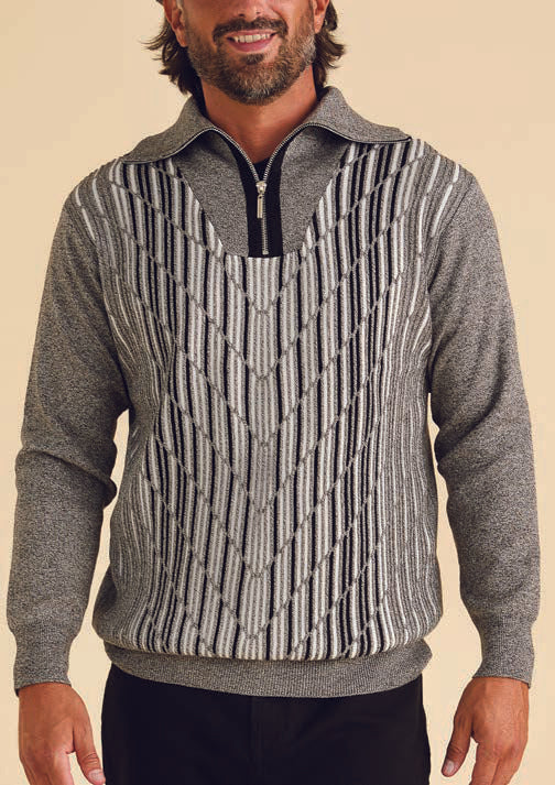 A man wearing the Inserch Intarsia Panel Half-Zip Sweater SW608-33 Grey, made from a viscose blend and showcasing a striking black and white geometric intarsia pattern on the front panel with a stylish half-zip collar.