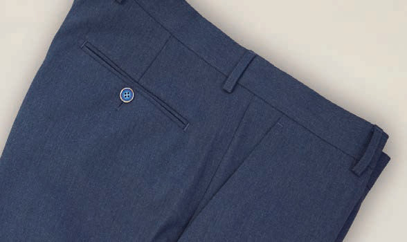 Close-up of the Inserch Denim Chino P274-10 in denim blue, showcasing a modern fit with tailored design, complete with a buttoned back pocket and belt loops crafted from a poly rayon blend.