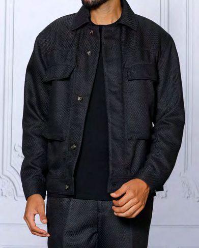 A person is dressed in the INSOMNIA FENDI 2PC Black Leisure Suit by Insomnia, standing against a light background with their head not visible.