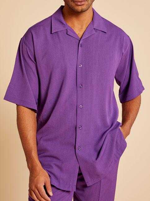 A person wearing an Inserch Crepe Camp Collar Shirt in purple high-twist poly-crepe, paired with matching pants.