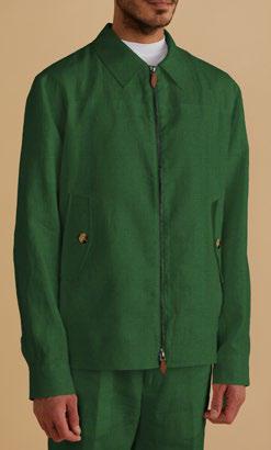 A person wearing the Inserch Linen Harrington Jacket Suit in Emerald, standing against a plain beige background.