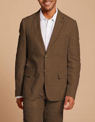 A person wearing the Inserch Slim Linen Suit SU880-00064 Mocha, featuring a premium linen blazer and white shirt, paired with slim fit trousers, stands against a beige background.