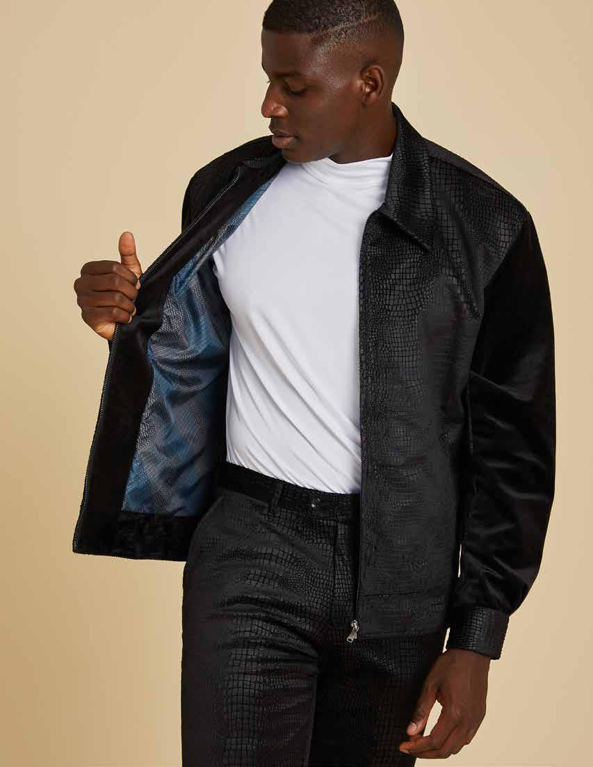 A person wearing the Inserch Sueded Snake Skin Embossed Jacket JS268-01 in black with a printed lining and regular-fit pants over a white shirt, standing against a plain background.