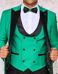 A person wearing the INSOMNIA ROME 3PC Slim Fit Apple Spandex Tuxedo Suit by Insomnia, featuring a bright green hue with a black lapel and a coordinating bow tie.